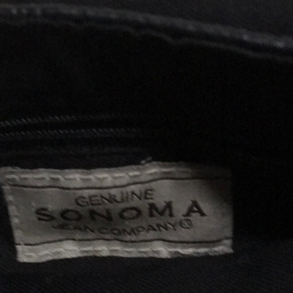 Black leather purse. Four separate pockets. Magnetic closure. 10”x11” - Picture 5 of 5